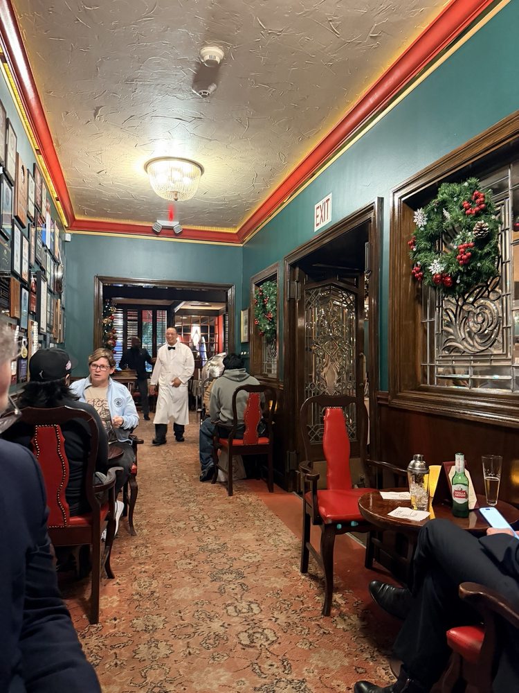 The wood-paneled hallway inside House of Prime Rib